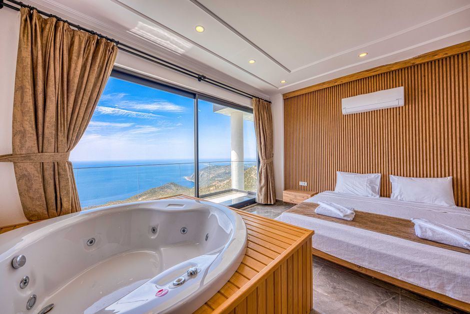 Harbor View King room with a window over the docks